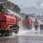 Kodam Jaya Bergerak Cepat, 147 Water Tank Semprot Jalan yang Dipenuhi Debu Vulkanik
(Foto: purnamanews
/AI)